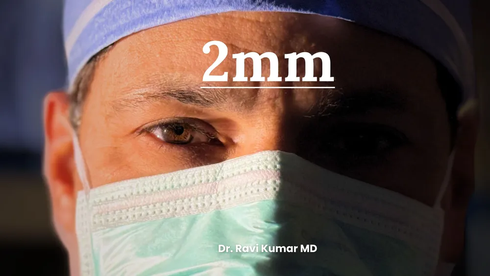 Dr. Ravi Kumar in surgical cap and mask, cover of the book 2mm